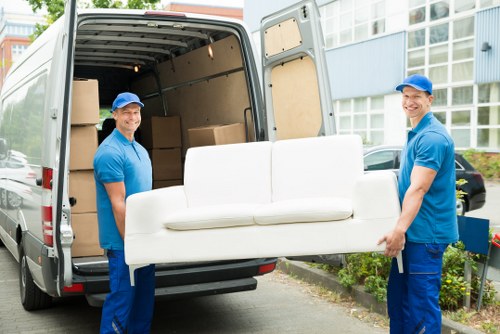 Removal team planning a safe move with packing materials