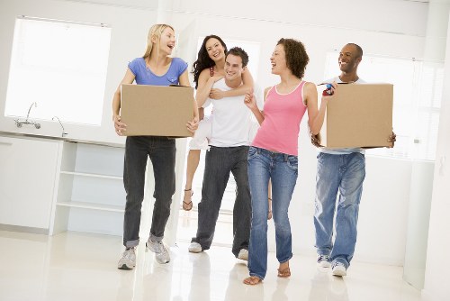 Removal company team reviewing ethical labour compliance in Sutton