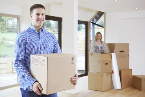 Team unpacking household essentials in a Sutton property