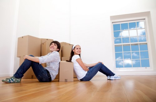 Moving staff using protective equipment during a house move