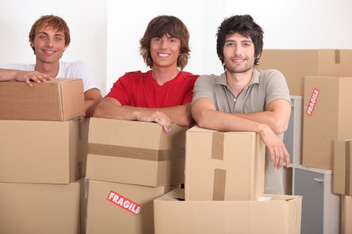 Moving team discussing an issue from a home removal